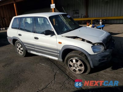 Czwarte zdjęcie samochodu z boku: 1996 TOYOTA RAV4 VIN:JT3HP10V3T0082010 - miniatura