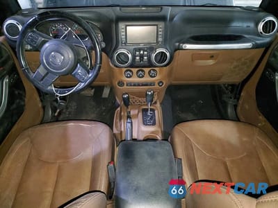 Zdjęcie 8 z 12 samochodu: 2015 JEEP WRANGLER UNLIMITED SAHARA VIN:1C4HJWEG6FL528447 - miniatura