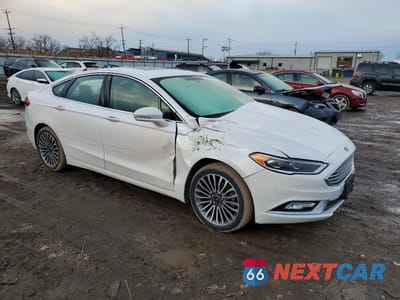 Czwarte zdjęcie samochodu z boku: 2017 FORD FUSION SE VIN:3FA6P0H96HR187710 - miniatura