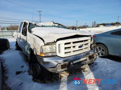 Czwarte zdjęcie samochodu z boku: 2003 FORD F350 SRW SUPER DUTY VIN:1FTSW31P03EC13008 - miniatura