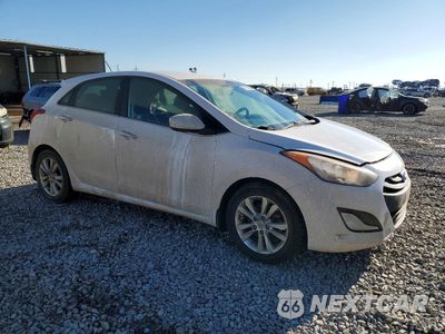 Czwarte zdjęcie samochodu z boku: 2014 HYUNDAI ELANTRA GT VIN:KMHD35LH7EU171508 - miniatura