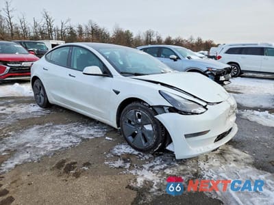Czwarte zdjęcie samochodu z boku: 2023 TESLA MODEL 3 VIN:5YJ3E1EA8PF554257 - miniatura