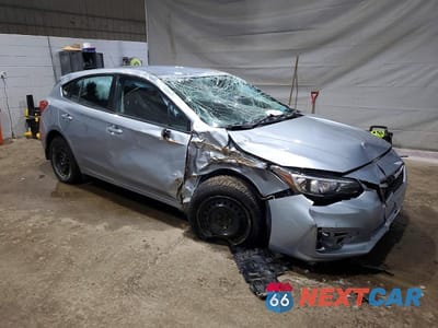 Czwarte zdjęcie samochodu z boku: 2017 SUBARU IMPREZA VIN:4S3GTAA60H1713890 - miniatura