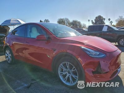 Czwarte zdjęcie samochodu z boku: 2022 TESLA MODEL Y VIN:7SAYGDEE2NF343799 - miniatura
