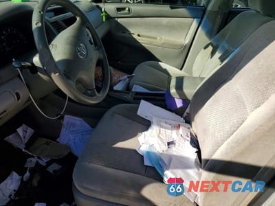 Zdjęcie 7 z 11 samochodu: 2004 TOYOTA CAMRY LE VIN:4T1BE32K14U303826 - miniatura