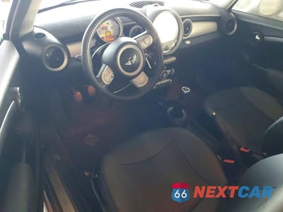 Zdjęcie 8 z 11 samochodu: 2010 MINI COOPER VIN:WMWMF3C50ATU76903 - miniatura