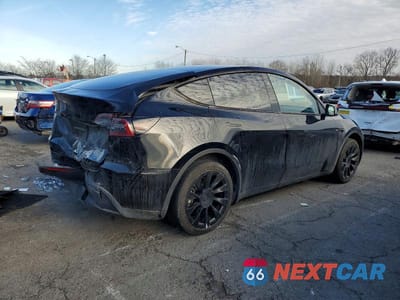 Trzecie zdjęcie samochodu z tyłu: 2023 TESLA MODEL Y VIN:7SAYGDEE8PA159693 - miniatura