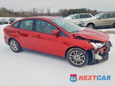 Czwarte zdjęcie samochodu z boku: 2018 FORD FOCUS SE VIN:1FADP3F22JL291887 - miniatura