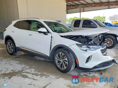 Czwarte zdjęcie samochodu z boku: 2022 BUICK ENVISION ESSENCE VIN:LRBFZNR41ND053260 - miniatura