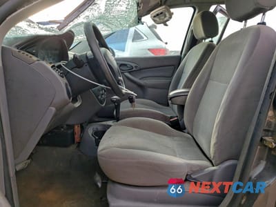Zdjęcie 7 z 15 samochodu: 2002 FORD FOCUS SE VIN:1FAFP36342W286871 - miniatura