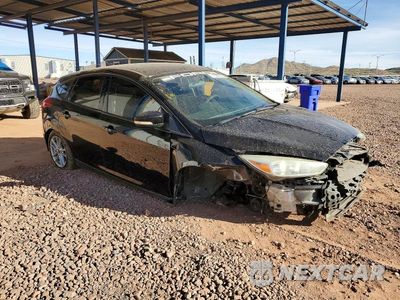 Czwarte zdjęcie samochodu z boku: 2017 FORD FOCUS SE VIN:1FADP3K22HL216493 - miniatura