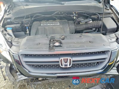 Zdjęcie 12 z 13 samochodu: 2005 HONDA PILOT EXL VIN:2HKYF18555H572733 - miniatura