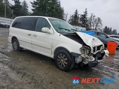 Czwarte zdjęcie samochodu z boku: 2005 KIA SEDONA VIN:KNDUP132156770339 - miniatura