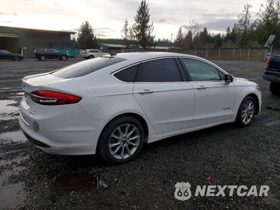 Trzecie zdjęcie samochodu z tyłu: 2017 FORD FUSION SE HYBRID VIN:3FA6P0LUXHR409189 - miniatura