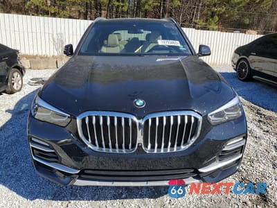 Piąte zdjęcie samochodu w środku: 2021 BMW X5 XDRIVE45E VIN:5UXTA6C08M9F27716 - miniatura