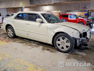 Czwarte zdjęcie samochodu z boku: 2005 CHRYSLER 300 TOURING VIN:2C3JK53GX5H677570 - miniatura