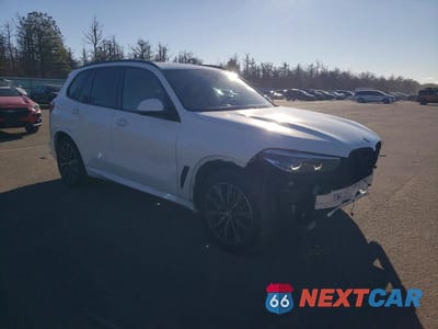 Czwarte zdjęcie samochodu z boku: 2021 BMW X5 XDRIVE40I VIN:5UXCR6C03M9G97412 - miniatura
