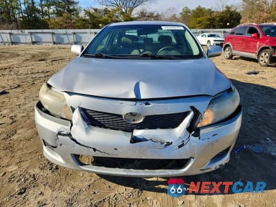 Piąte zdjęcie samochodu w środku: 2009 TOYOTA COROLLA BASE VIN:2T1BU40E39C143141 - miniatura