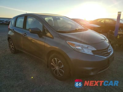 Czwarte zdjęcie samochodu z boku: 2016 NISSAN VERSA NOTE S VIN:3N1CE2CPXGL396781 - miniatura