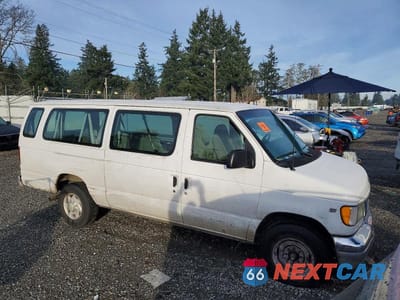 Czwarte zdjęcie samochodu z boku: 2002 FORD ECONOLINE E350 SUPER DUTY WAGON VIN:1FBSS31S32HA07361 - miniatura