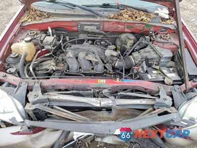 Zdjęcie 12 z 13 samochodu: 2004 MAZDA TRIBUTE LX VIN:4F2YZ04104KM03319 - miniatura