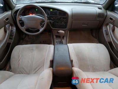 Zdjęcie 8 z 12 samochodu: 1995 TOYOTA CAMRY LE VIN:JT2GK12E1S0124877 - miniatura