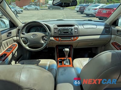 Zdjęcie 9 z 13 samochodu: 2002 TOYOTA CAMRY LE VIN:4T1BE32K52U027812 - miniatura