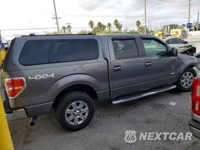 Trzecie zdjęcie samochodu z tyłu: 2014 FORD F150 SUPERCREW VIN:1FTFW1ET5EFB26196 - miniatura