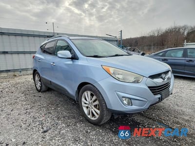 Czwarte zdjęcie samochodu z boku: 2012 HYUNDAI TUCSON SPORT VIN:KM8JU3ACXCU498753 - miniatura
