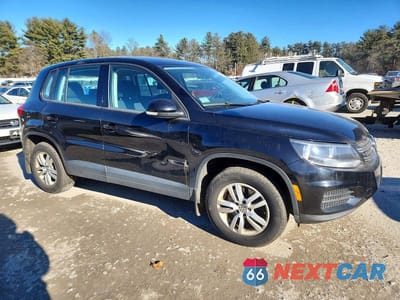 Czwarte zdjęcie samochodu z boku: 2014 VOLKSWAGEN TIGUAN S VIN:WVGBV3AX9EW518518 - miniatura