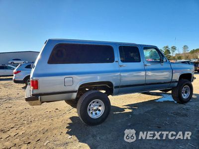 Trzecie zdjęcie samochodu z tyłu: 1991 GMC SUBURBAN V25 CONVENTIONAL VIN:1GKGV26K5MF504314 - miniatura