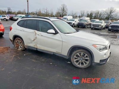 Czwarte zdjęcie samochodu z boku: 2014 BMW X1 XDRIVE28I VIN:WBAVL1C54EVR92757 - miniatura