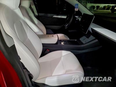 Zdjęcie 13 z 14 samochodu: 2023 TESLA MODEL Y VIN:7SAYGDEEXPF912093 - miniatura