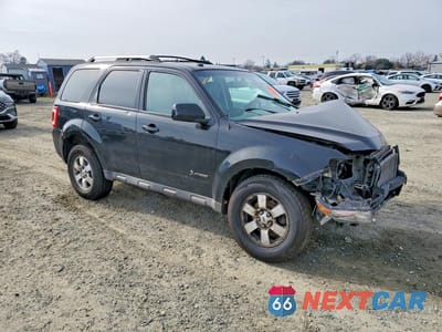 Czwarte zdjęcie samochodu z boku: 2010 FORD ESCAPE HYBRID VIN:1FMCU5K3XAKB56604 - miniatura