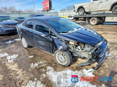 Czwarte zdjęcie samochodu z boku: 2016 FORD FIESTA TITANIUM VIN:3FADP4CJ3GM154448 - miniatura