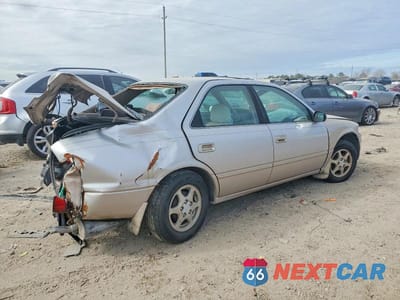 Trzecie zdjęcie samochodu z tyłu: 1997 TOYOTA CAMRY CE VIN:4T1BG22KXVU150773 - miniatura
