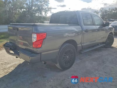 Trzecie zdjęcie samochodu z tyłu: 2019 NISSAN TITAN PLATINUM RESERVE VIN:1N6AA1E68KN533253 - miniatura