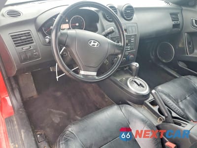 Zdjęcie 8 z 15 samochodu: 2003 HYUNDAI TIBURON GT VIN:KMHHN65F93U092142 - miniatura