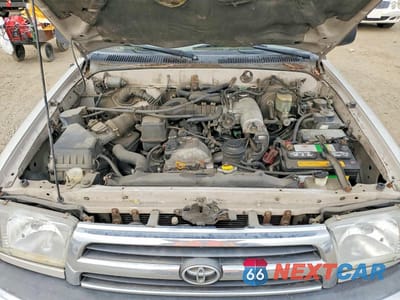 Zdjęcie 12 z 13 samochodu: 2000 TOYOTA 4RUNNER VIN:JT3GM84R3Y0058047 - miniatura