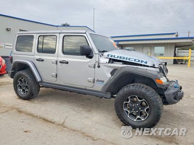 Czwarte zdjęcie samochodu z boku: 2021 JEEP WRANGLER UNLIMITED RUBICON 4XE VIN:1C4JJXR63MW700292 - miniatura