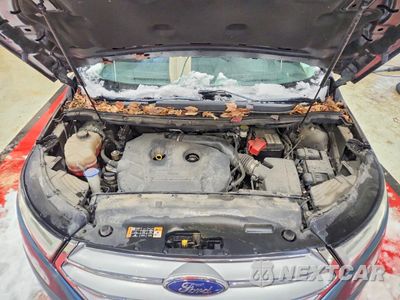 Zdjęcie 12 z 13 samochodu: 2016 FORD EDGE SEL VIN:2FMPK4J98GBB56949 - miniatura