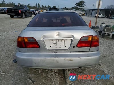 Zdjęcie 6 z 12 samochodu: 1999 HONDA CIVIC BASE VIN:2HGEJ6614XH515886 - miniatura