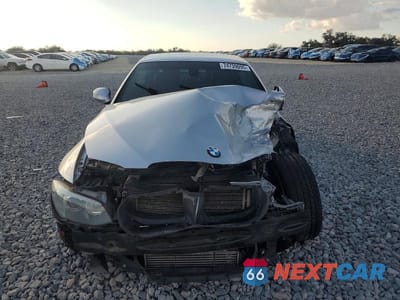 Piąte zdjęcie samochodu w środku: 2012 BMW 335 I VIN:WBADX7C53CE744287 - miniatura