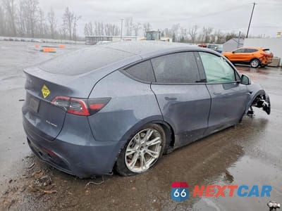 Trzecie zdjęcie samochodu z tyłu: 2023 TESLA MODEL Y VIN:7SAYGDEE0PA074010 - miniatura