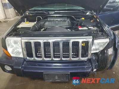 Zdjęcie 12 z 13 samochodu: 2009 JEEP COMMANDER LIMITED VIN:1J8HG58P19C501299 - miniatura