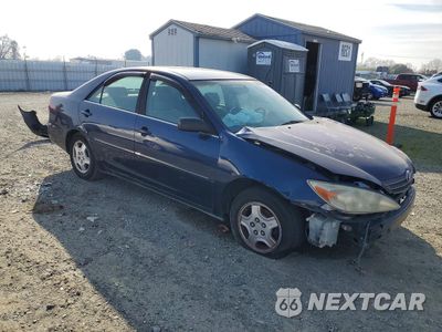 Czwarte zdjęcie samochodu z boku: 2002 TOYOTA CAMRY LE VIN:JTDBE30K620055164 - miniatura