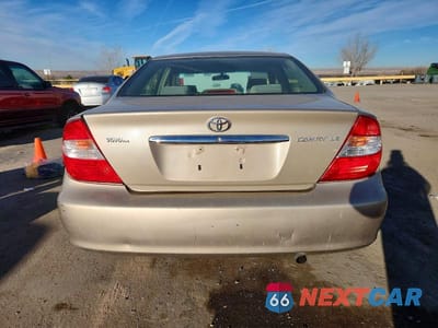 Zdjęcie 6 z 11 samochodu: 2003 TOYOTA CAMRY LE VIN:4T1BE32KX3U771519 - miniatura