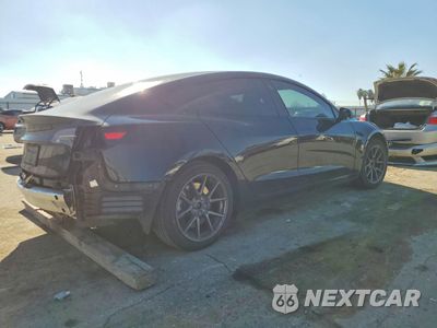 Trzecie zdjęcie samochodu z tyłu: 2023 TESLA MODEL 3 VIN:5YJ3E1EA0PF625550 - miniatura