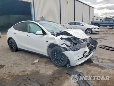 Czwarte zdjęcie samochodu z boku: 2022 TESLA MODEL Y VIN:7SAYGAEE3NF306923 - miniatura