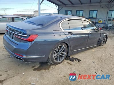 Trzecie zdjęcie samochodu z tyłu: 2020 BMW 750 XI VIN:WBA7U2C06LGJ59771 - miniatura